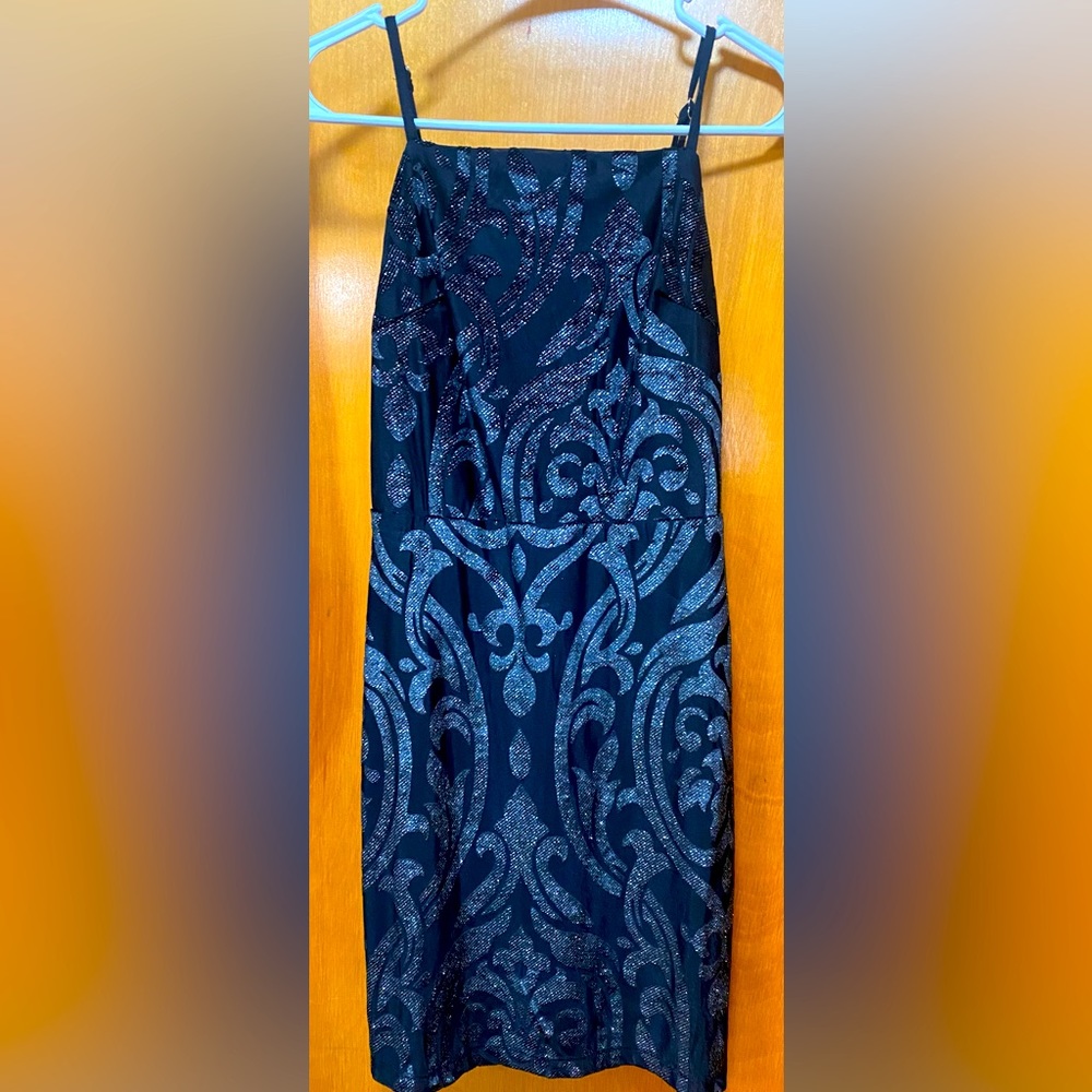 Little black dress with glitter. Good for homecoming, prom, NYE, or other event.